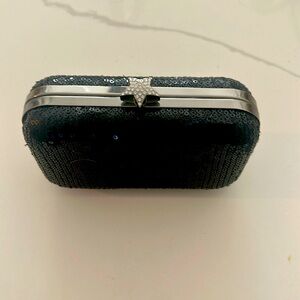 Black sequence evening clutch